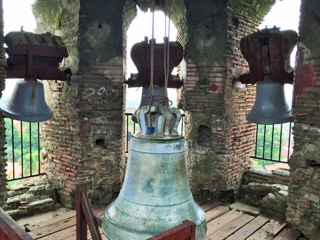 Huge bell with smaller bells at the corners